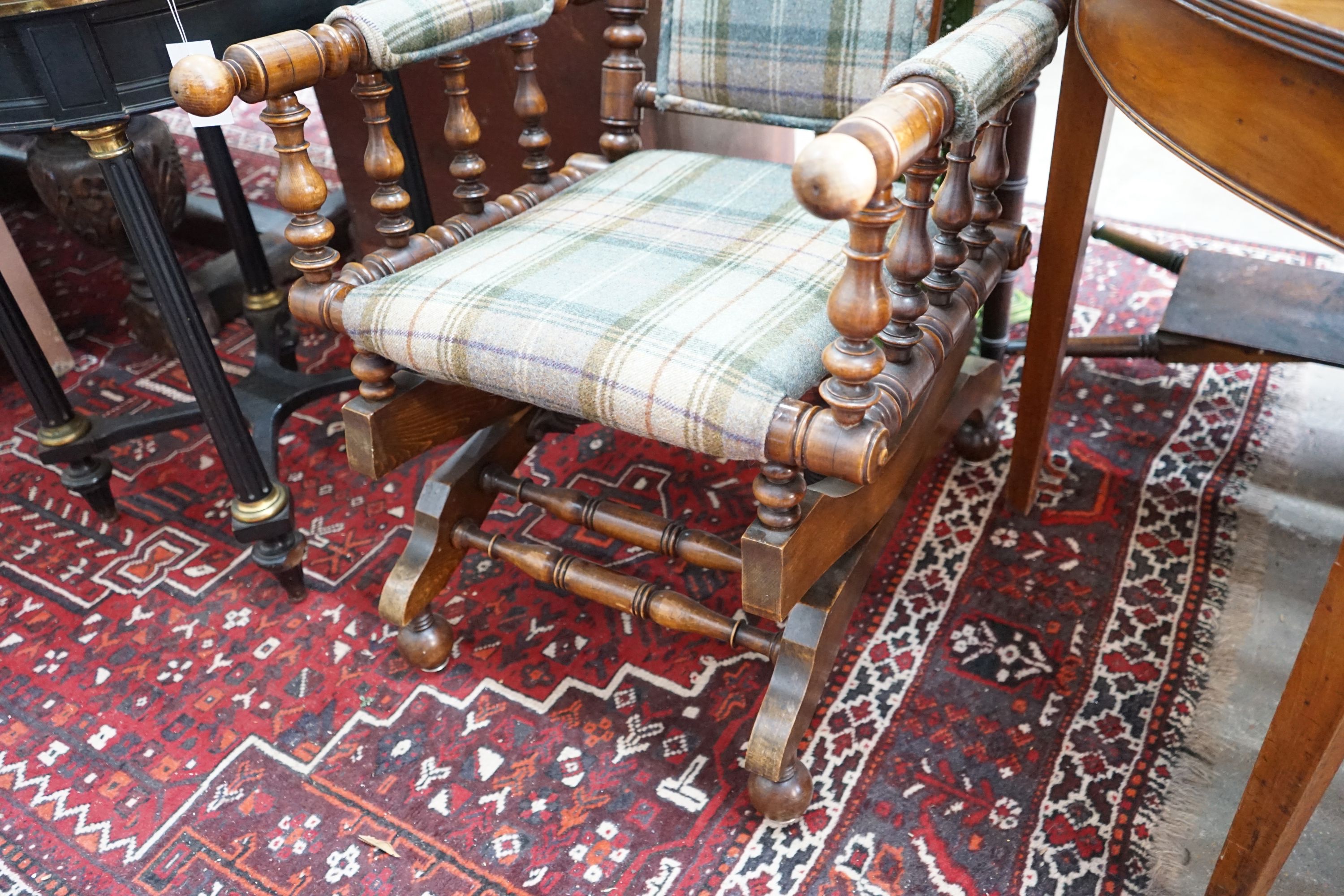 A late 19th century American turned beech rocking chair, width 58cm, depth 50cm, height 122cm